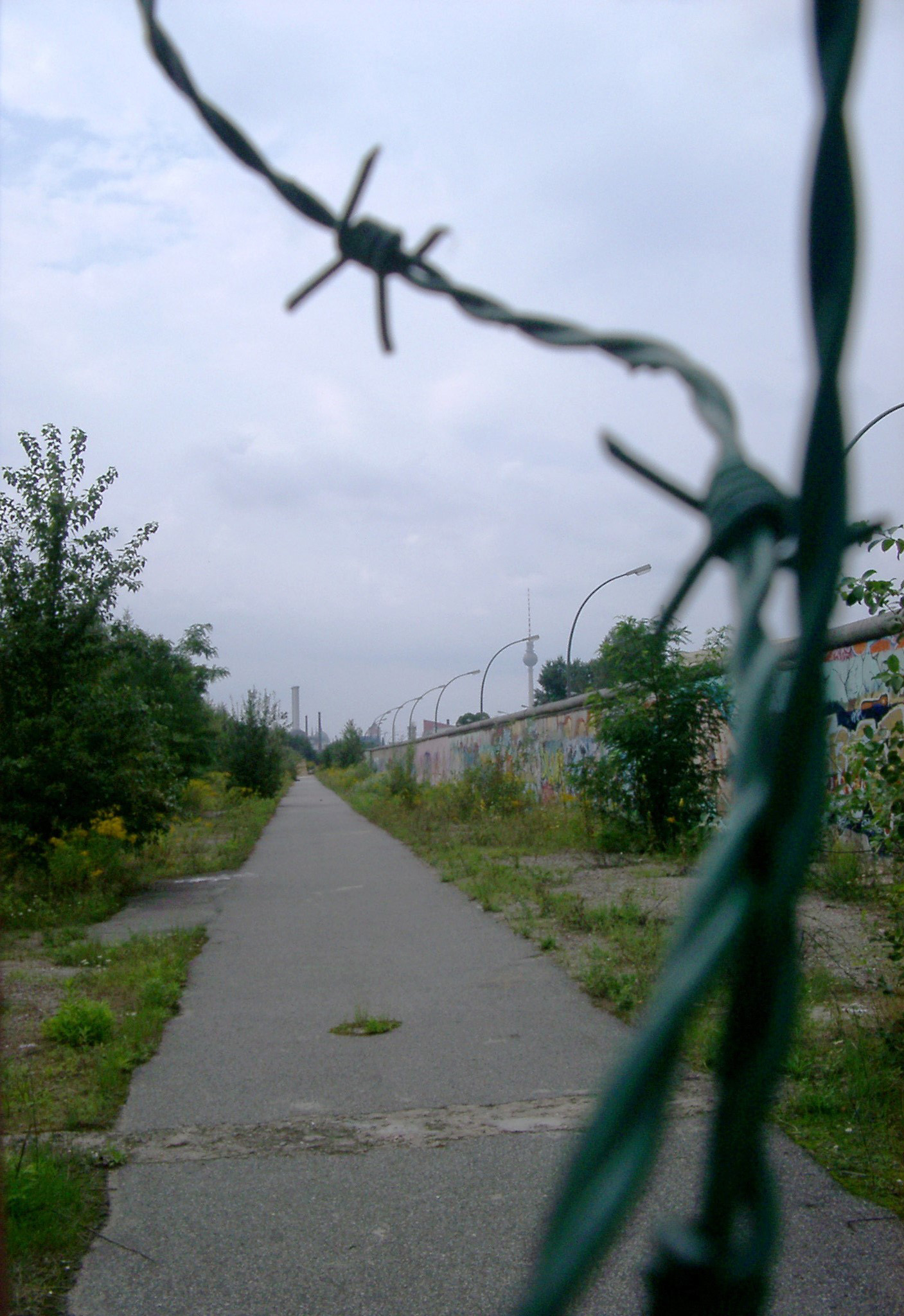 an image of Barbed Wire and Pathway Along Berlin Wall, Germany