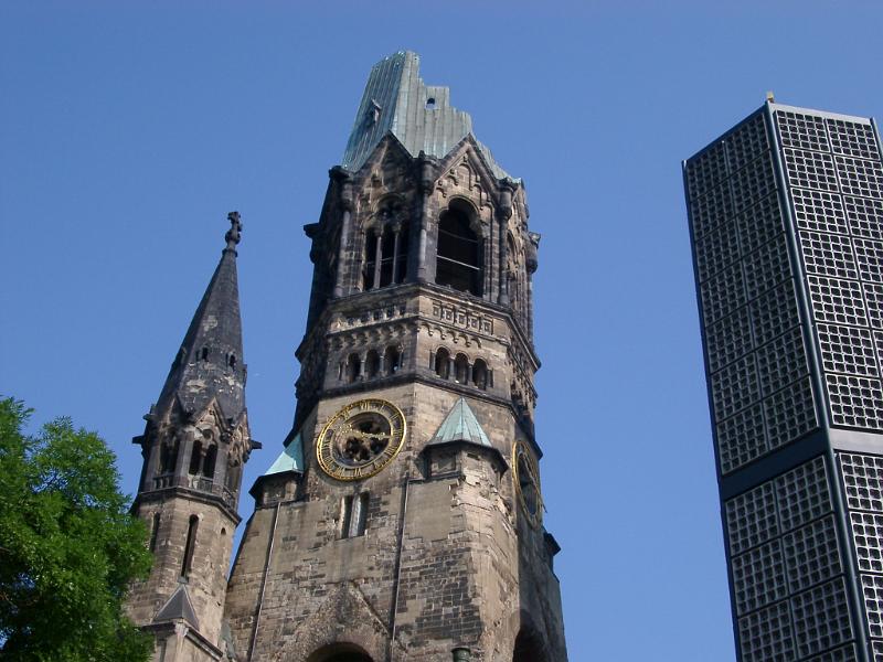 Ruin of Kaiser Wilhelm Memorial Church with New Belfry in Berlin, Germany