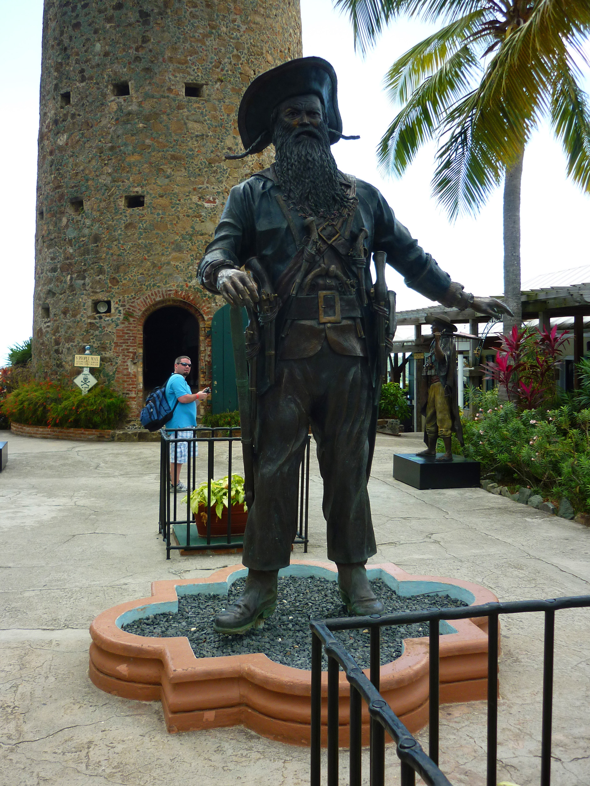an image of a statue of pirate blackbeard and his castle tower to the rear, St. Thomas, US virgin islands