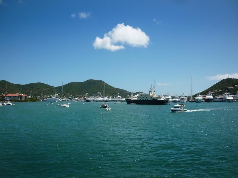 curise boats and motor yachts in the harbour at st maarten