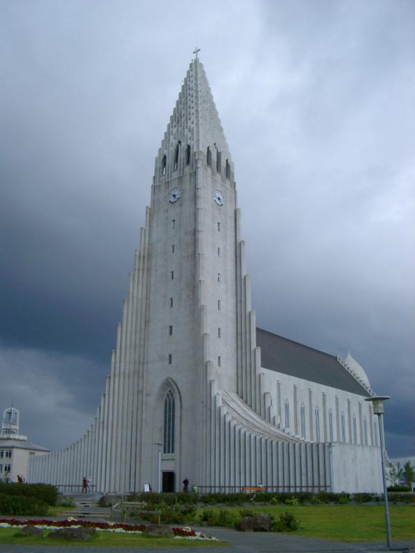 Lutheran Hallgrim Cathedral under a dramatic cloudy sky, Reykjavik, Iceland