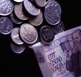 Close Up of Icelandic Krona Coins and Bills Currency on Black Background