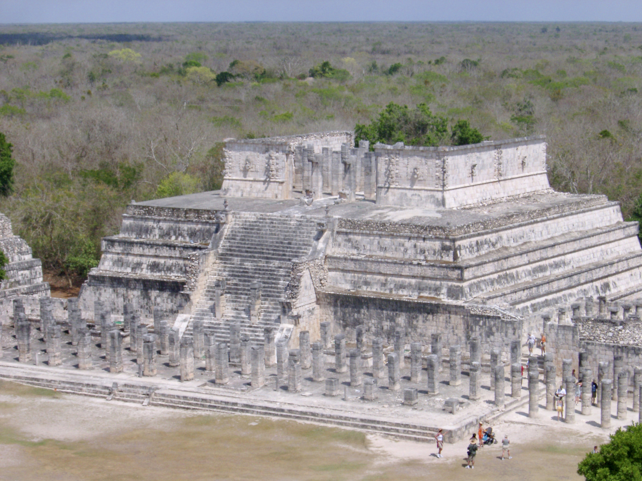 an image of Stone ruins of the Temple of the Warriors in the Chitzen Itza Mayan ruins on the Yucatan Peninsula, Mexico