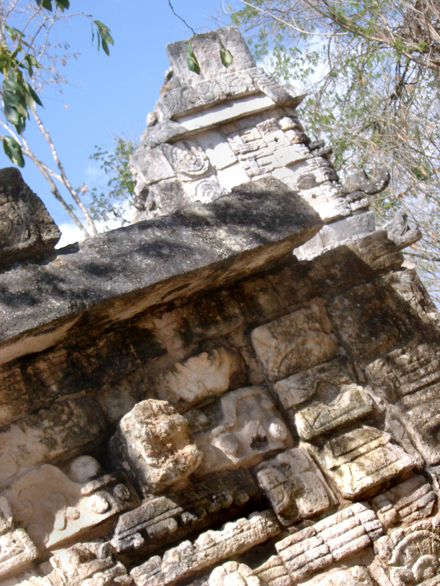 an image of Close up Historic Stone Made Deformed Structure at Chichen Itza. Captured at Day Light.