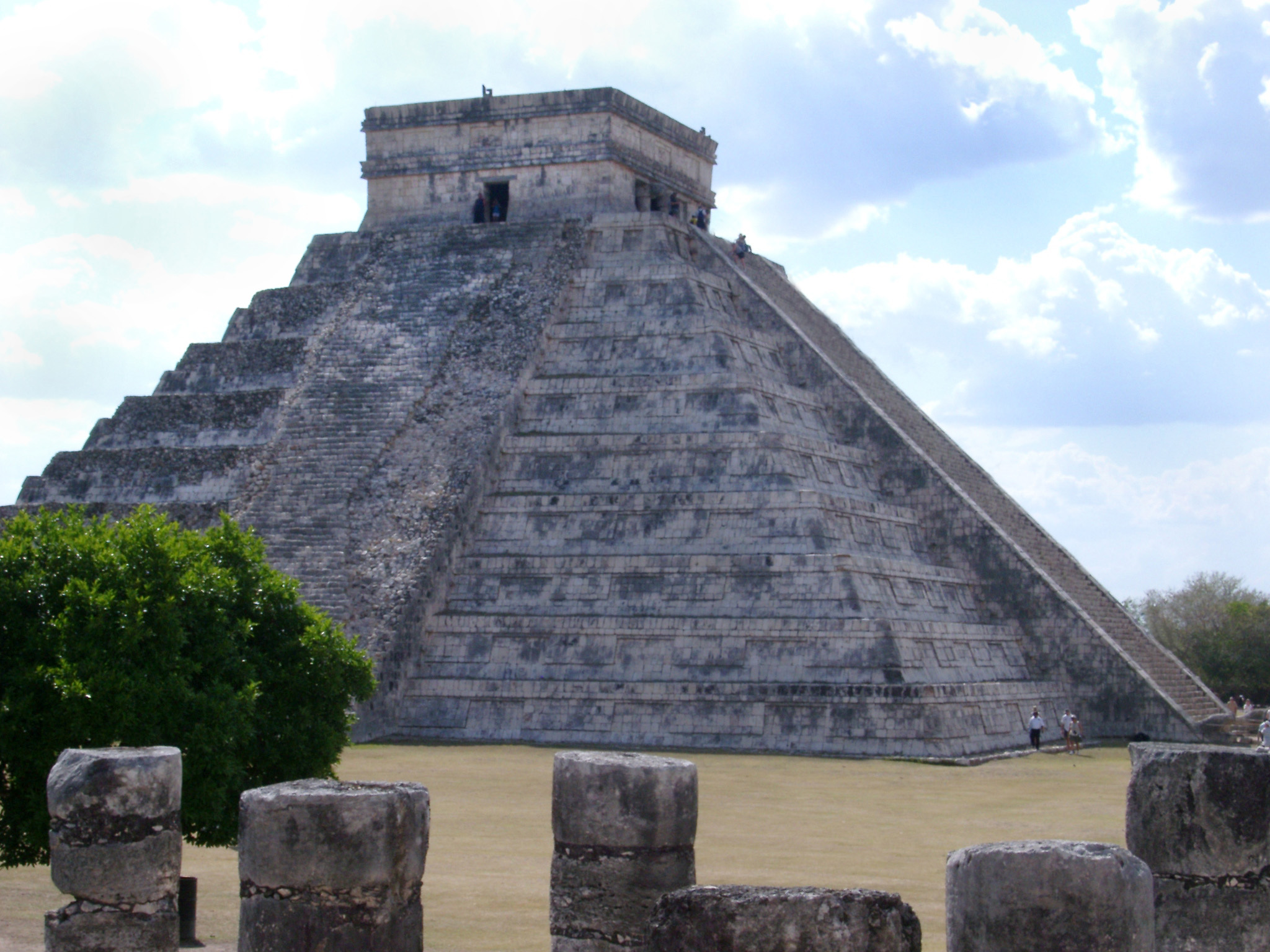 an image of El Castillo temple built in the shape of a pyramid at the Mayan ruins of Chitzen Itza, Yucatan Peninsula, Mexico