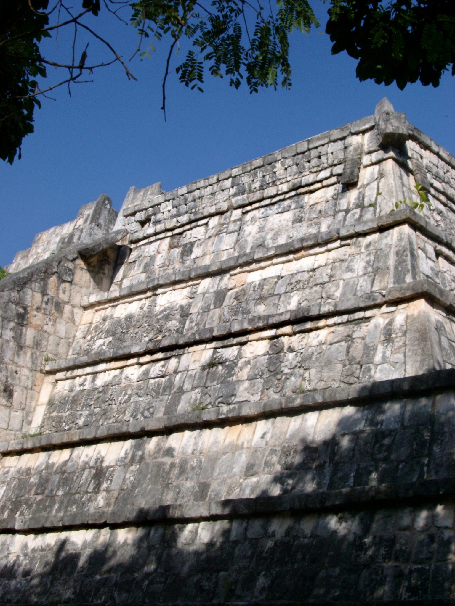 an image of Close up view of the stone walls of the High priests tomb, Chitzen Itza Mayan ruins in the Yucatan Peninsula, Mexico