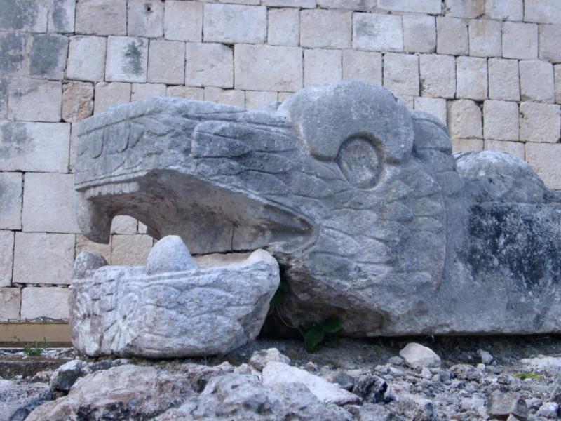 Close up Historic Animal Like Deformed Structure at Chichen Itza. Isolated on Historic Stone Wall Background.