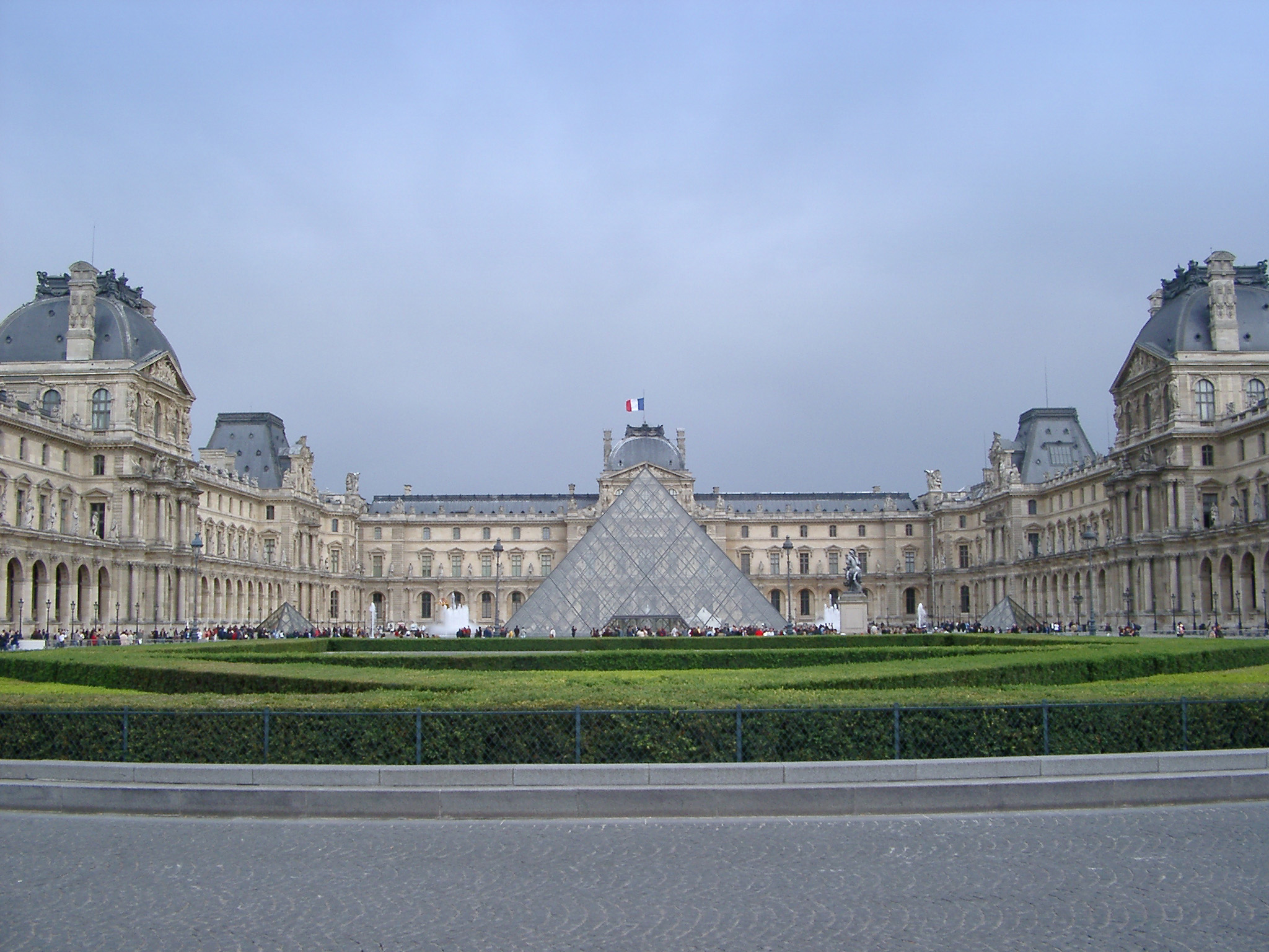 an image of Exterior of Louvre Art Museum and Pyramide Inversee with Overcast Sky, Paris, France