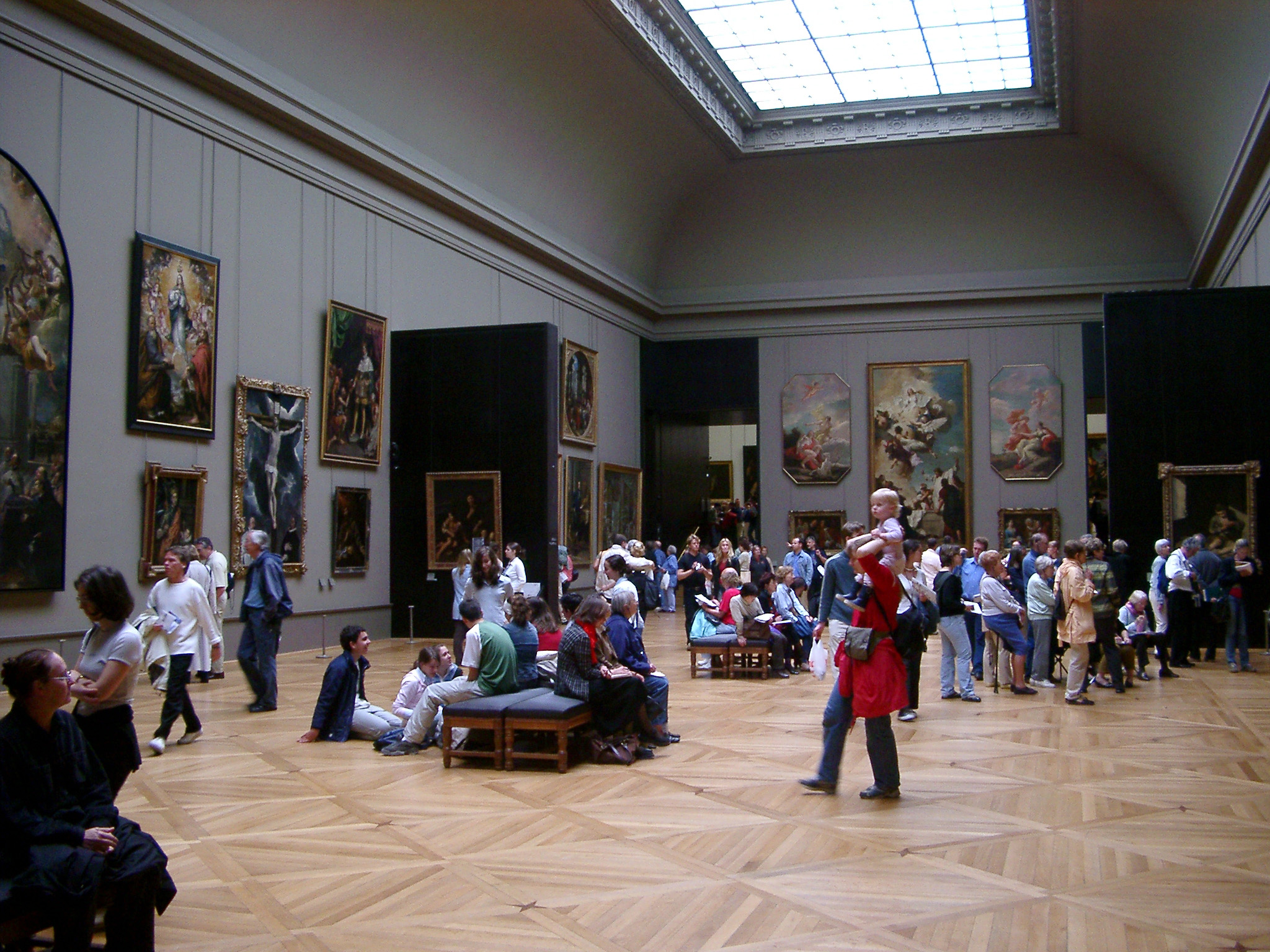 an image of Crowds of visitors and tourists inside the Louvre Museum, Paris