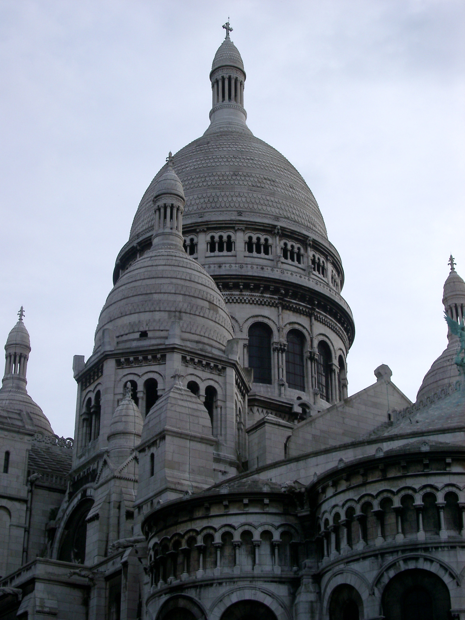 an image of Catholic Basilica of the Sacred Heart, with Romano-Byzantine architectural style, famous tourist attraction from Paris, France