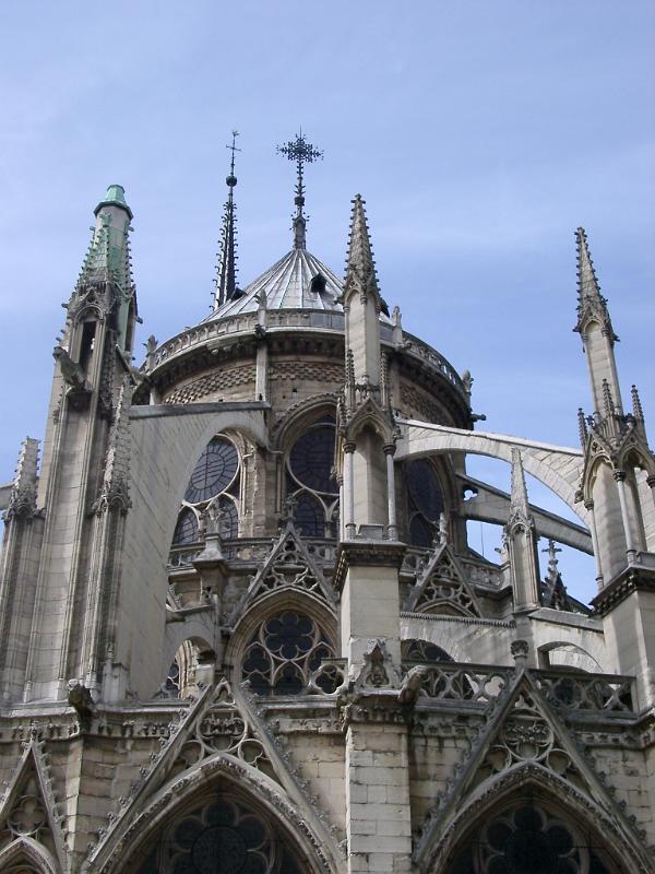 Famous Historic Artistic Notre Dame Church Building. Isolated on Light Blue Sky Background.