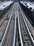 Metro lines in Paris with point detail for changing tracks with two lines running between the lanes a dual carriageway with multiple lanes of traffic
