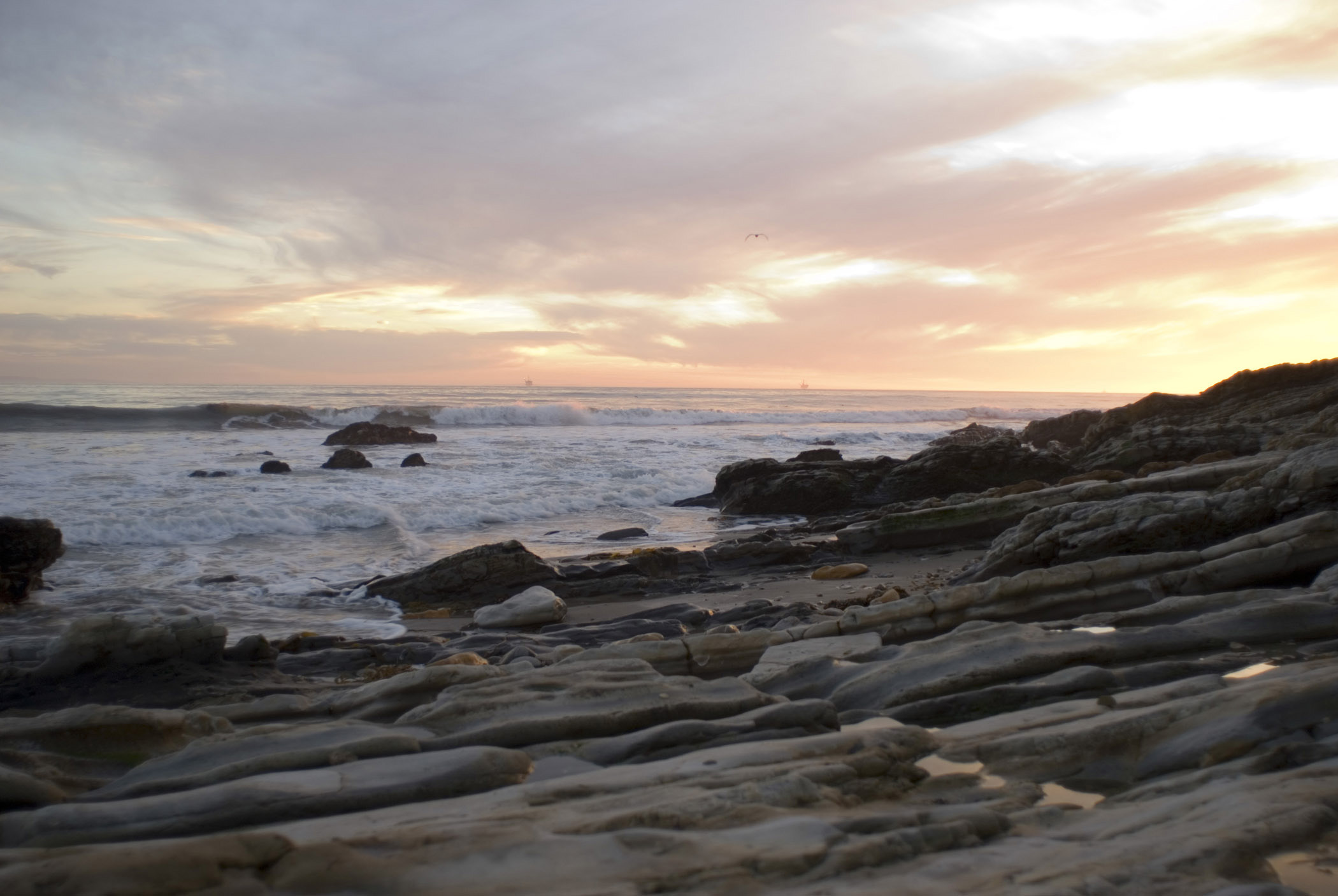 an image of Sunset at Beautiful Refugio Beach with Rocks at the Seashore, Located in California.