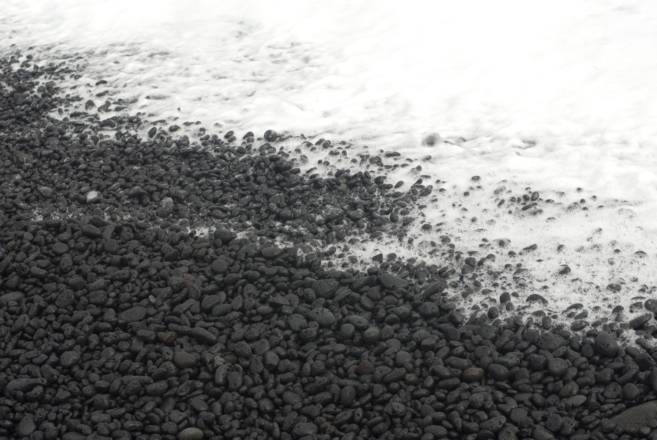 an image of Close up Gray Scale Plenty Small Stones at Kalapana Beach Shore