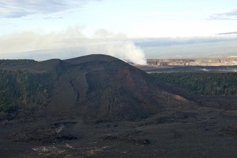 Looking over the lava field and volcanic steam vent in the Kilauea Iki crater, Volcanoes National Park, Hawaii