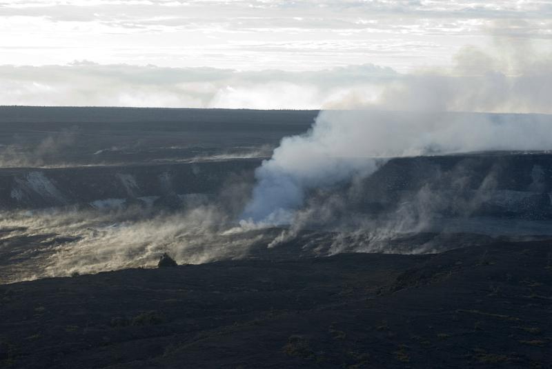 Volcanoes National Park, Hawaii with a view of the Halemaumau crater, on the Kilauea caldera erupting in a cloud of hot vapor and steam