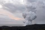 Smoke From Hot Volcanic Stream Coming From the Ground on Gray Sky Background.