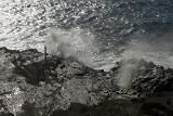 Gray Scale Aerial View Halona Blowhole Beach in Honolulu. The blowhole was formed by a molten lava tube from volcanic eruptions.
