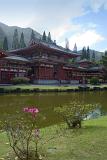 Byodo-In Buddhist Temple, a replica Japanese temple for worship in the lush Hawaiian landscape, viewed across a tranquil pond