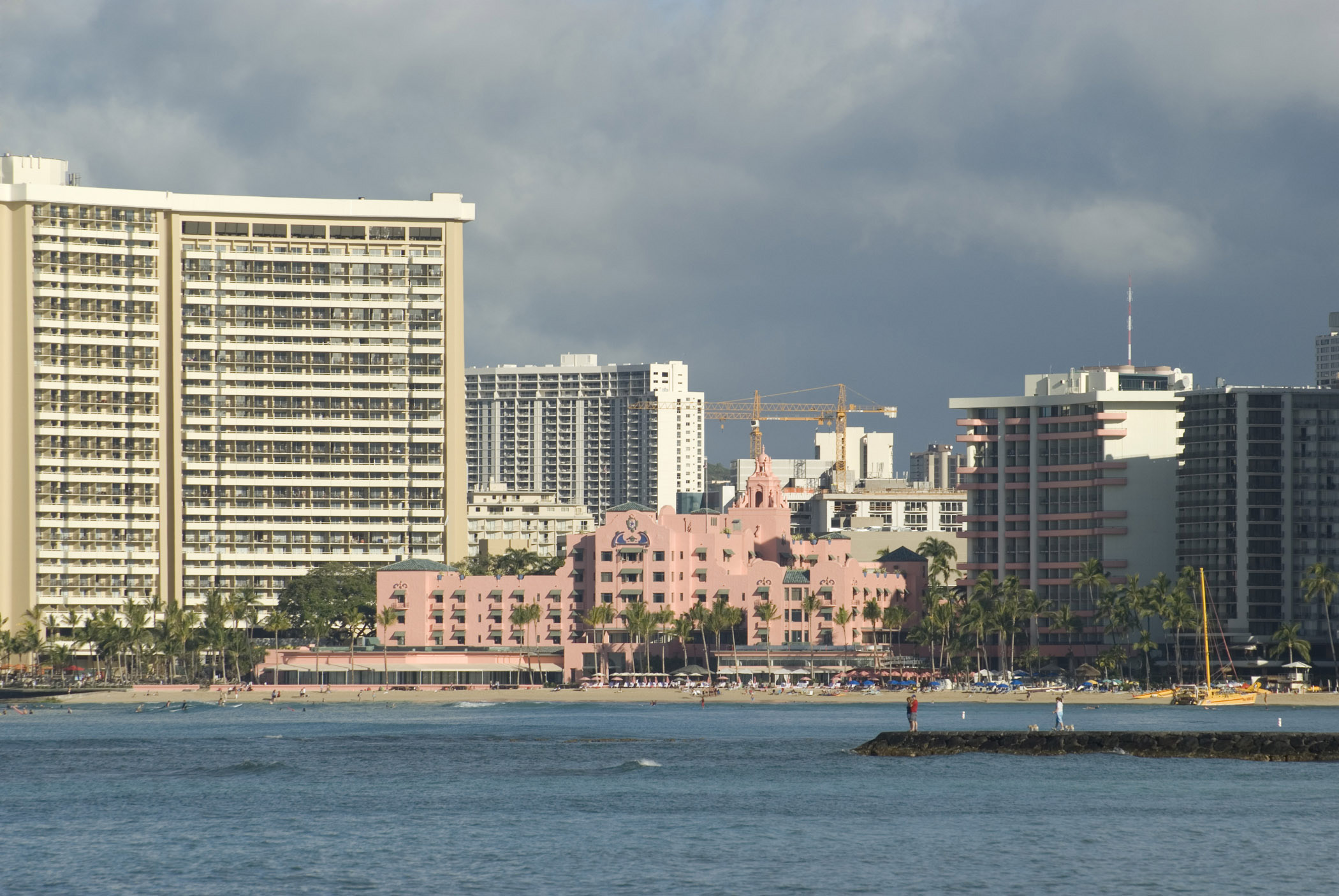 an image of High Rise Architectural Resort Hotels and Business Buildings on Stormy Sky Background.