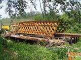 Old historical covered wooden bridge over a river in Madison County, USA