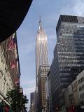 Famous High Architectural Empire State Building in New York, Isolated on Light Blue Sky Background.