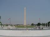 Tourists at Famous Washington Monument. Isolated on Light Blue Gray Background.