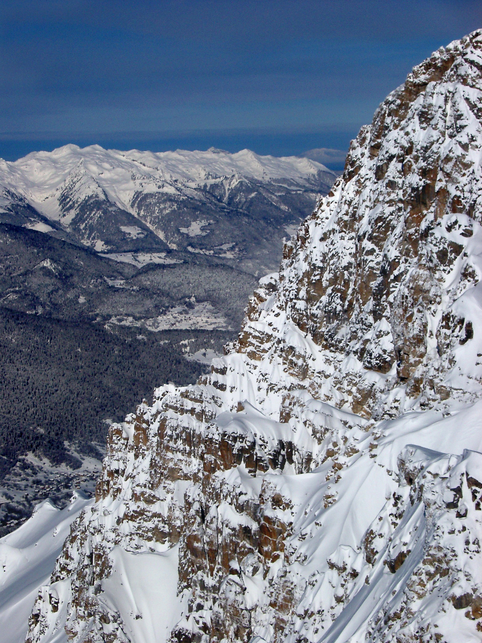 an image of Beautiful View of Huge French Mountains Covered with Snow During Winter Holiday Season.